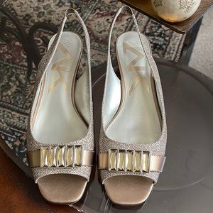 Gold tone shoes by Anne Klein Sport